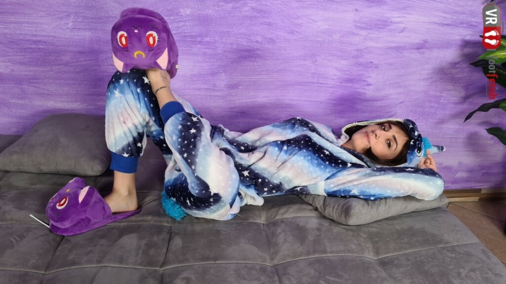 Stunning Aradia In A One-Piece Hooded Pajama And Purple Slippers - Image 2